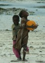 africa, kid playing at the beach